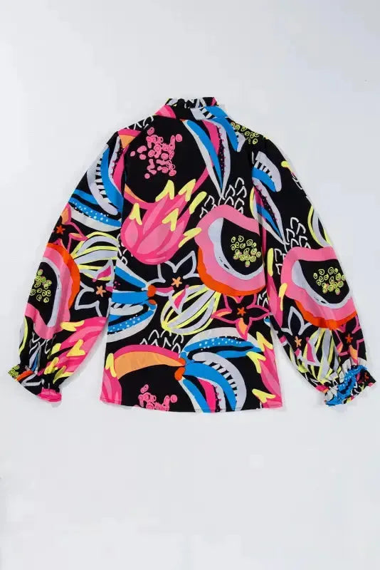 Ethereal Patterns Ruffled V-Neck Blouse