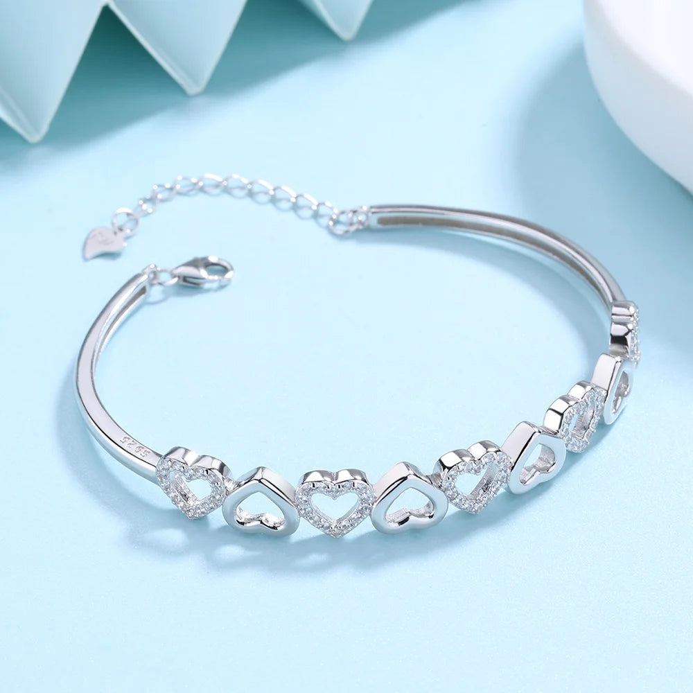 14K White Gold Hearts Bracelet