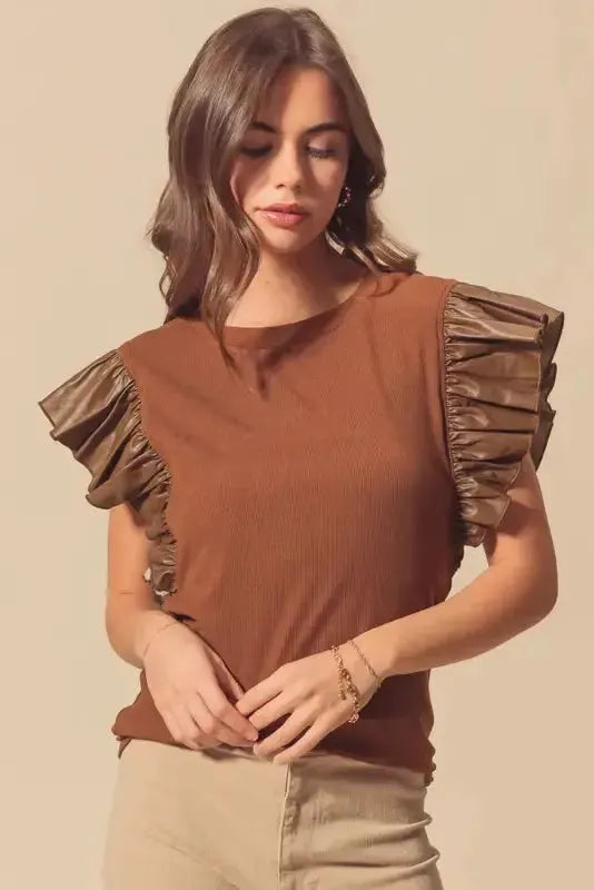 Cinnamon Ruffle Blouse – Chic Leather Sleeve Statement