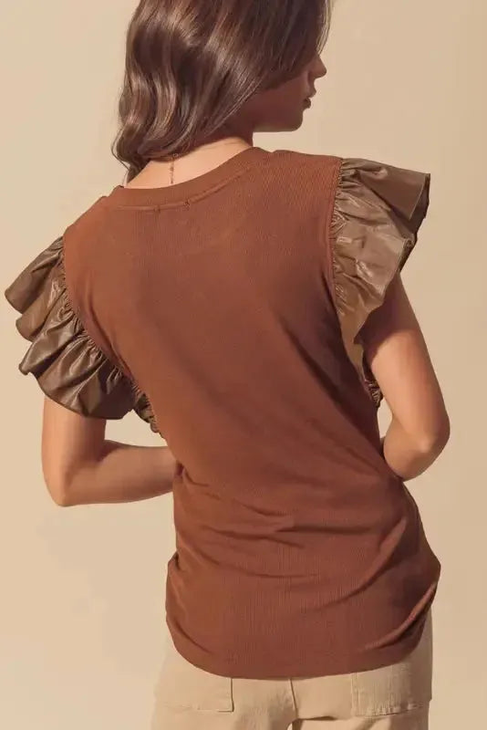 Cinnamon Ruffle Blouse – Chic Leather Sleeve Statement