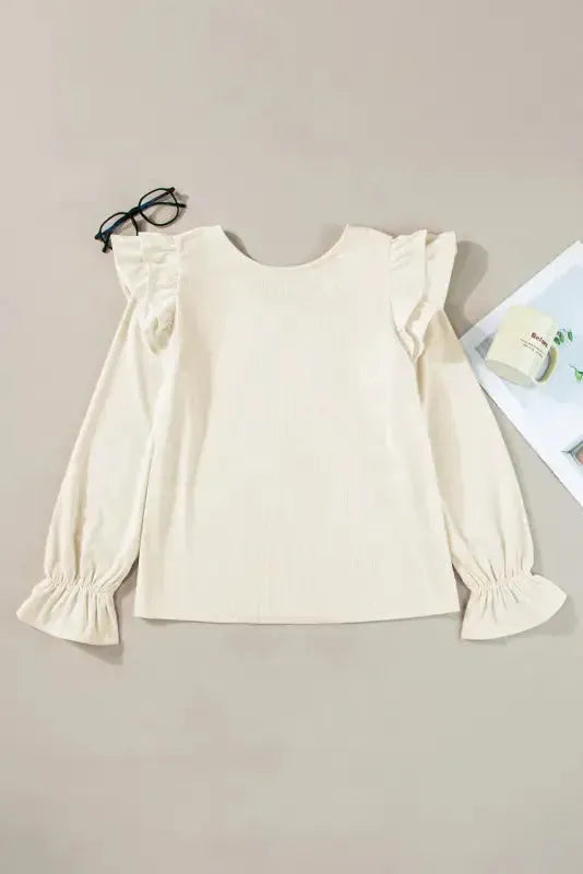 Μπλούζα με βολάν και charm από κοτλέ