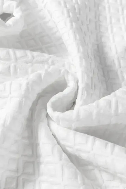 Ivory Elegance Textured Top